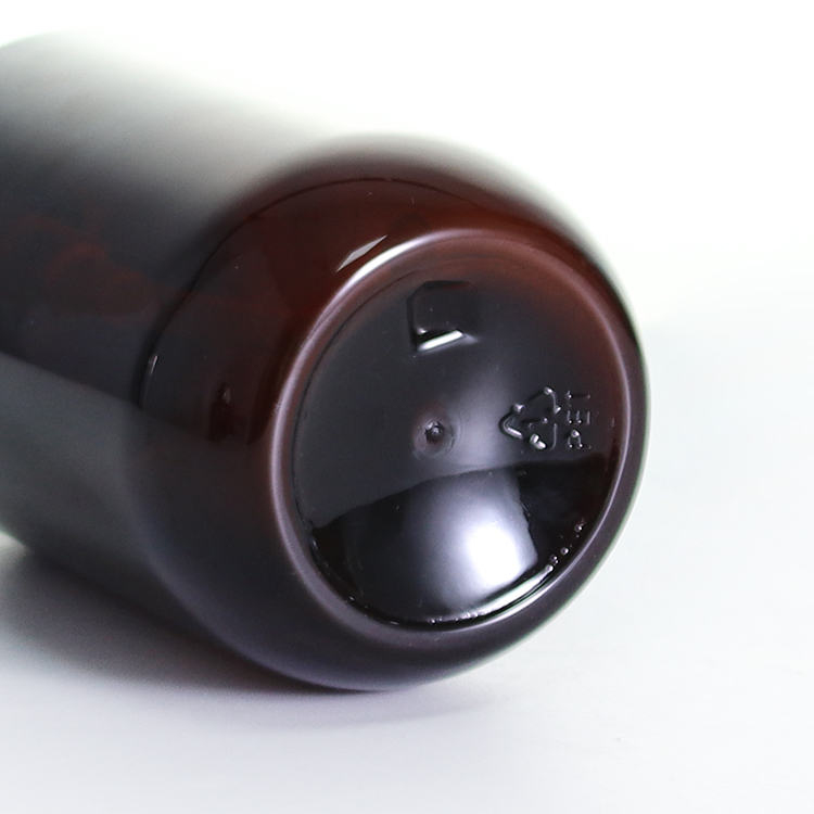Botella de loción de plástico de masaje negro para champú