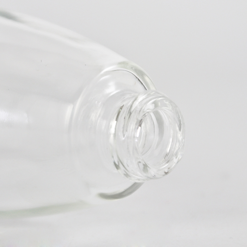 Botella de loción de vidrio ecológica de 1 oz con bomba