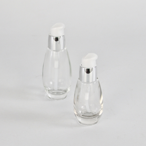 Botella de loción de vidrio ecológica de 1 oz con bomba
