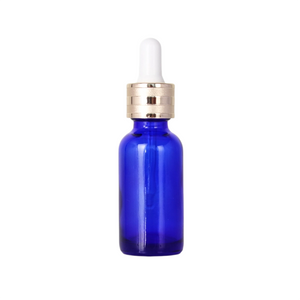 Botella de aceite esencial de vidrio azul de 30 ml para uso diario