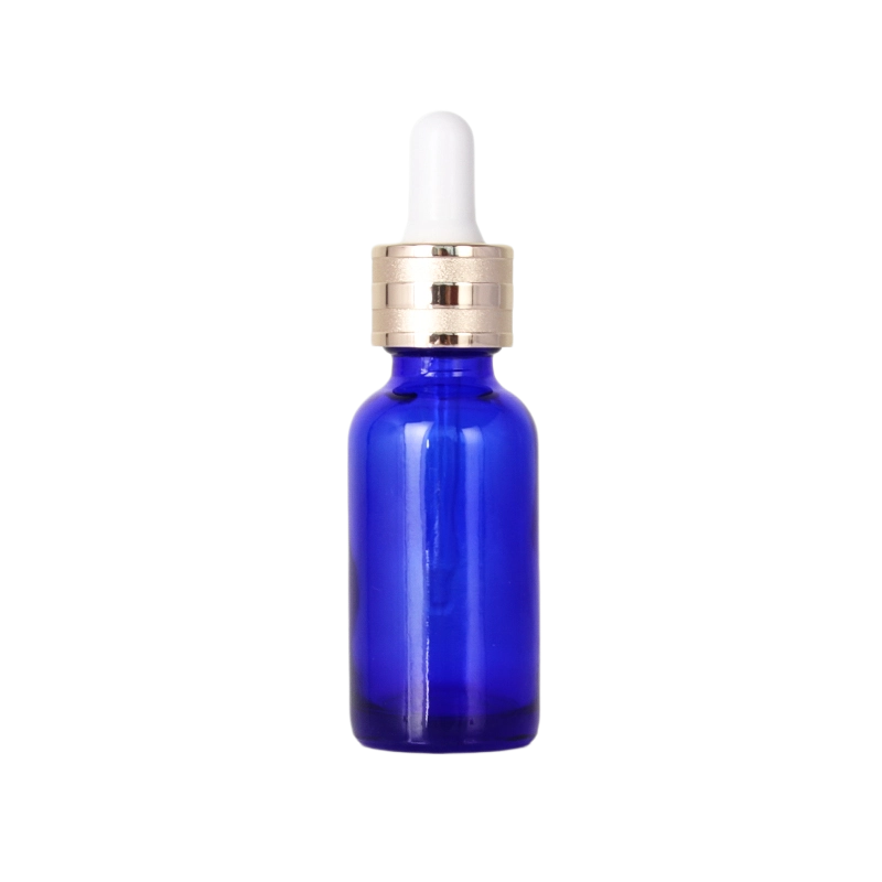 Botella de aceite esencial de vidrio azul de 30 ml para uso diario